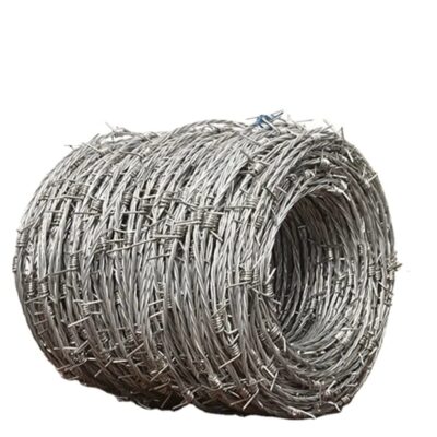 Barbed Wire On Top Of The Chain Link Fence